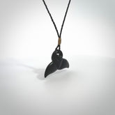 Hand carved Australian Black Jade whale tail pendant. Small whale tail necklace with adjustable cord.